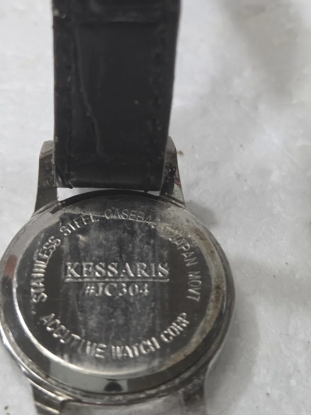 Kessaris Women's Silver Case Watch with Black Leather Strap